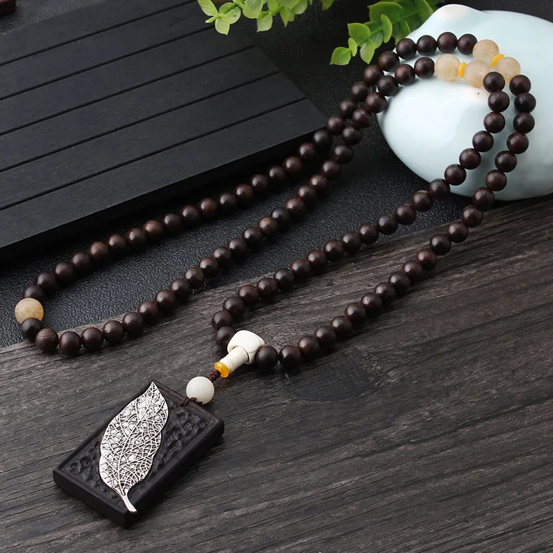 

Аксессуары для рукоделия: Оптовая продажа цепочек для свитеров в этническом стиле, ретро-подвески, простые и стильные подвески в виде листа из эбенового дерева, ожерелья с бусинами Будды для женщин.