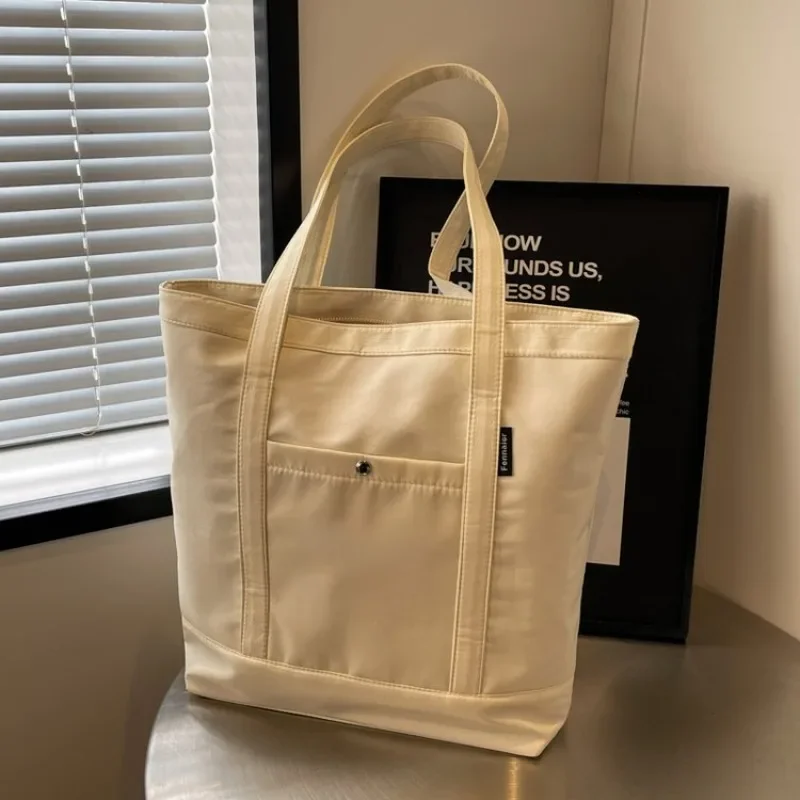 

Fashionable Unique Commuter Bag For Women With Minimalist Logo And Large Capacity In Elegant