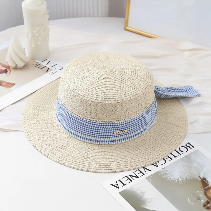 This blue checkered ribbon woven flat top hat is a versatile women's and shade that can make your face smaller