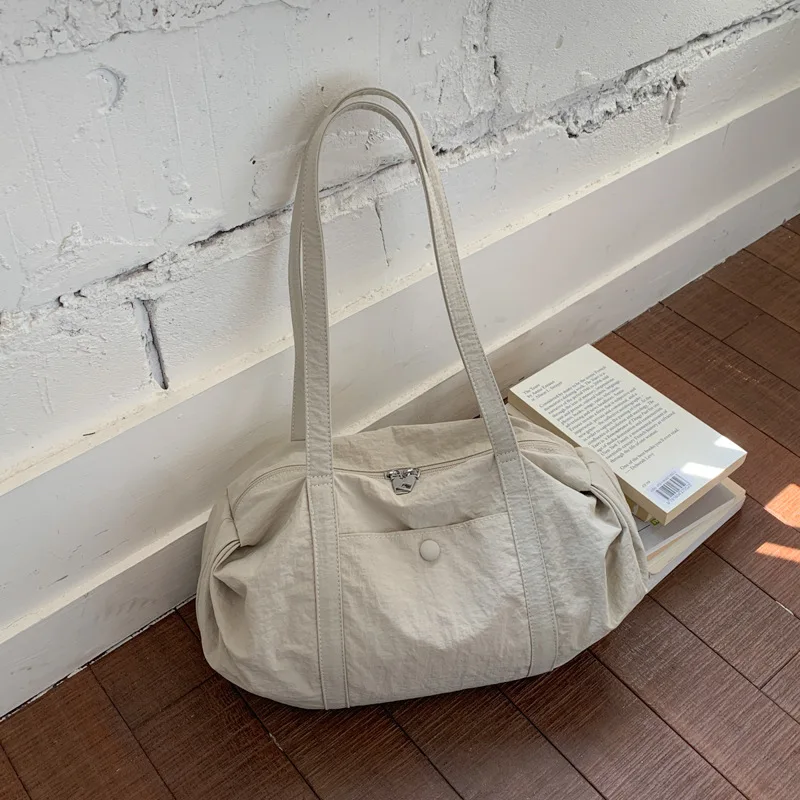 

Korean Style Ins Fashion Lightweight Nylon Shoulder Bag Women Large Capacity Simple Tote Bag for Travel Gym Versatile Pillow Bag