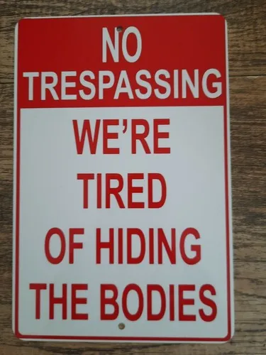 No Trespassing Were Tired of Hiding the Bodies  Metal Wall Sign