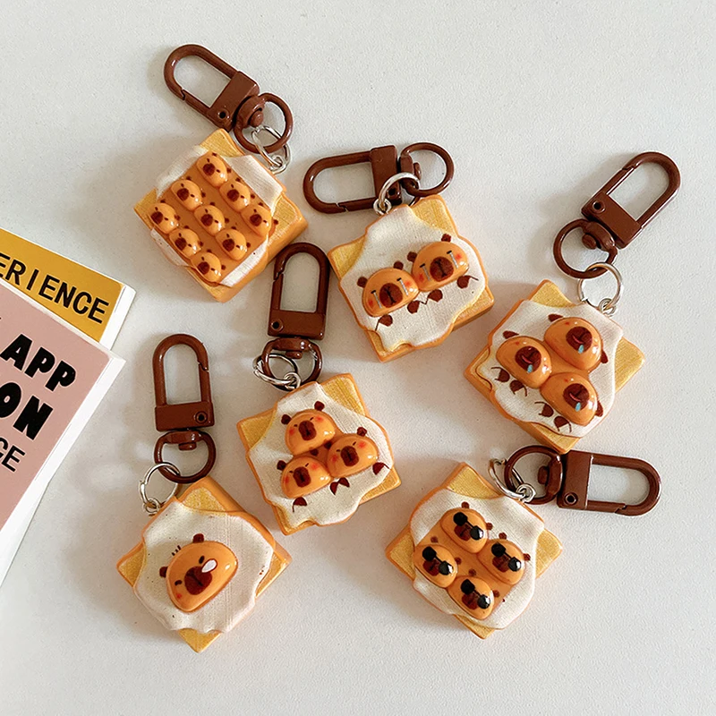 

1Pcs New Creative Toast Bread Capybara Keychain Imitation Food Game Resin Keyring Student Girl Ornaments Backpack Pendant Gift