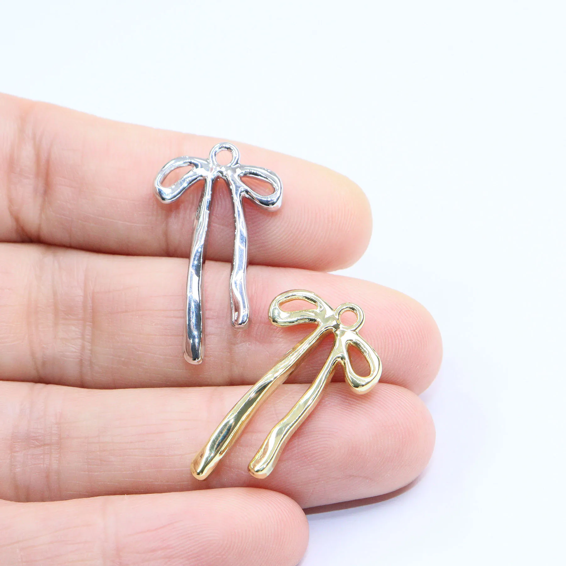 Eruifa 10pcs Wholesale Bow Women's Zinc Alloy Charms Accessory Girl's Fashion Necklace,Earring Bracelet Jewelry DIY Handmade