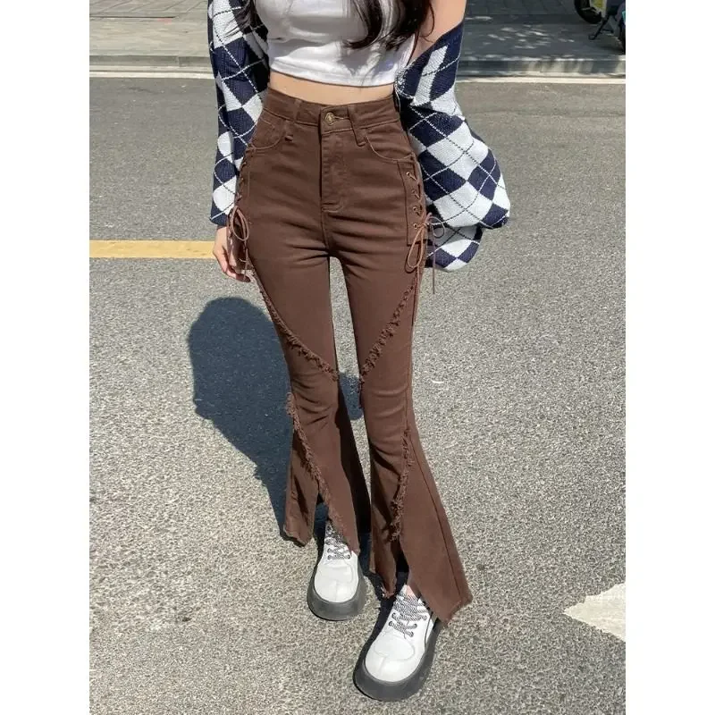 

Девушка Ретро кофейного цвета с бахромой по краям Студенческий галстук Слегка расклешенные джинсы Коричневые джинсы Новый стиль Пряные
