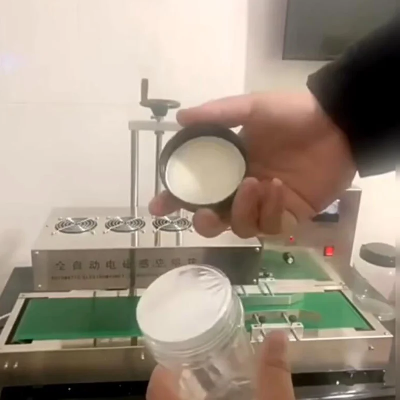 ماكينة ختم رقائق الألومنيوم بالحث الكهرومغناطيسي، ماكينة ختم الزجاجات البلاستيكية المستمرة التجارية الأوتوماتيكية