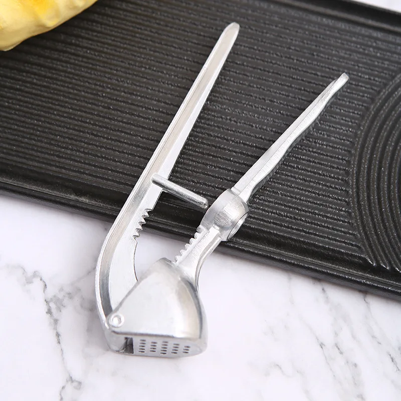 Multifunctional aluminum alloy garlic press household garlic paste clip garlic peeler Creative manual garlic rammer