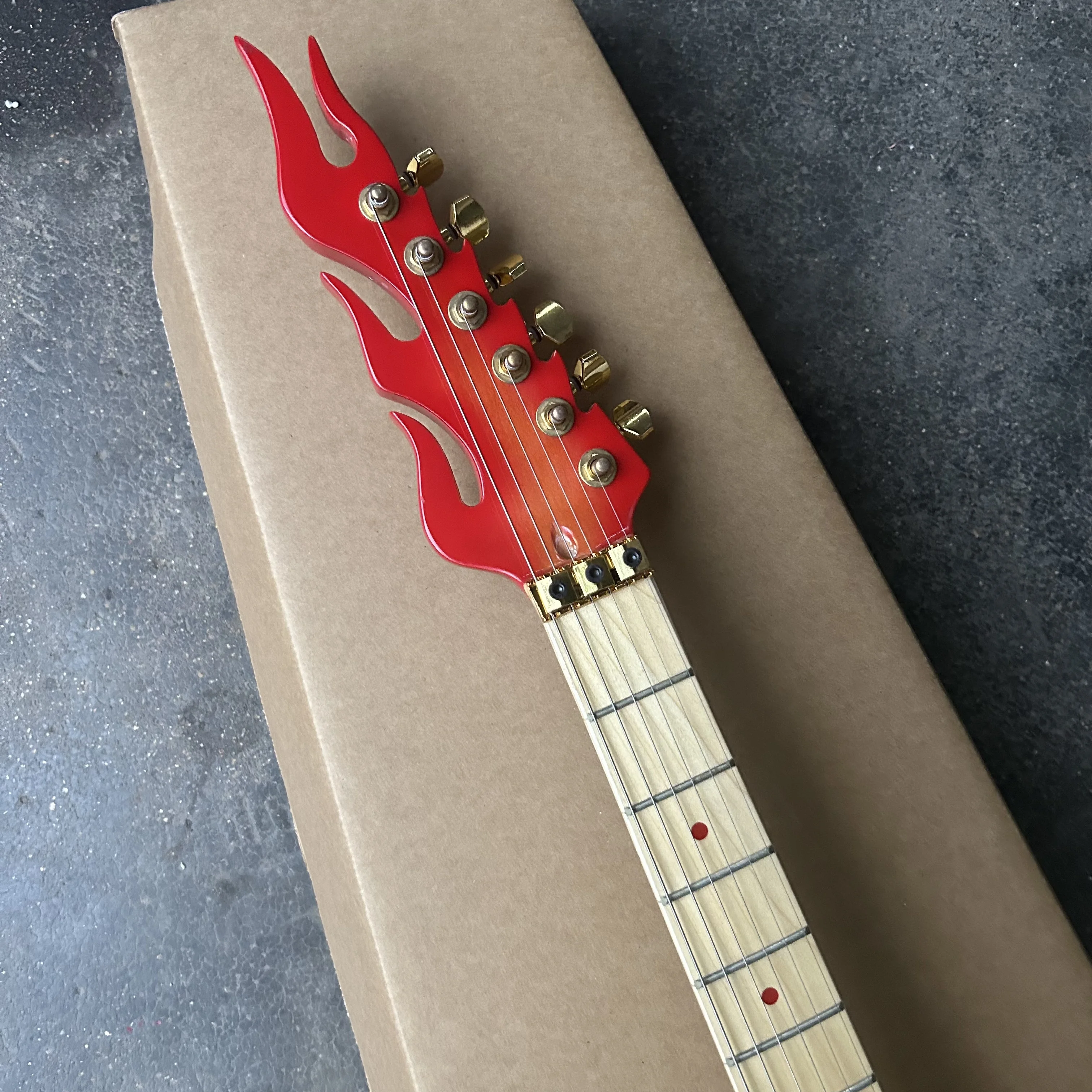 Inventory, new flame electric guitars, tiger patterned piano painted electric guitars, wholesale and retail