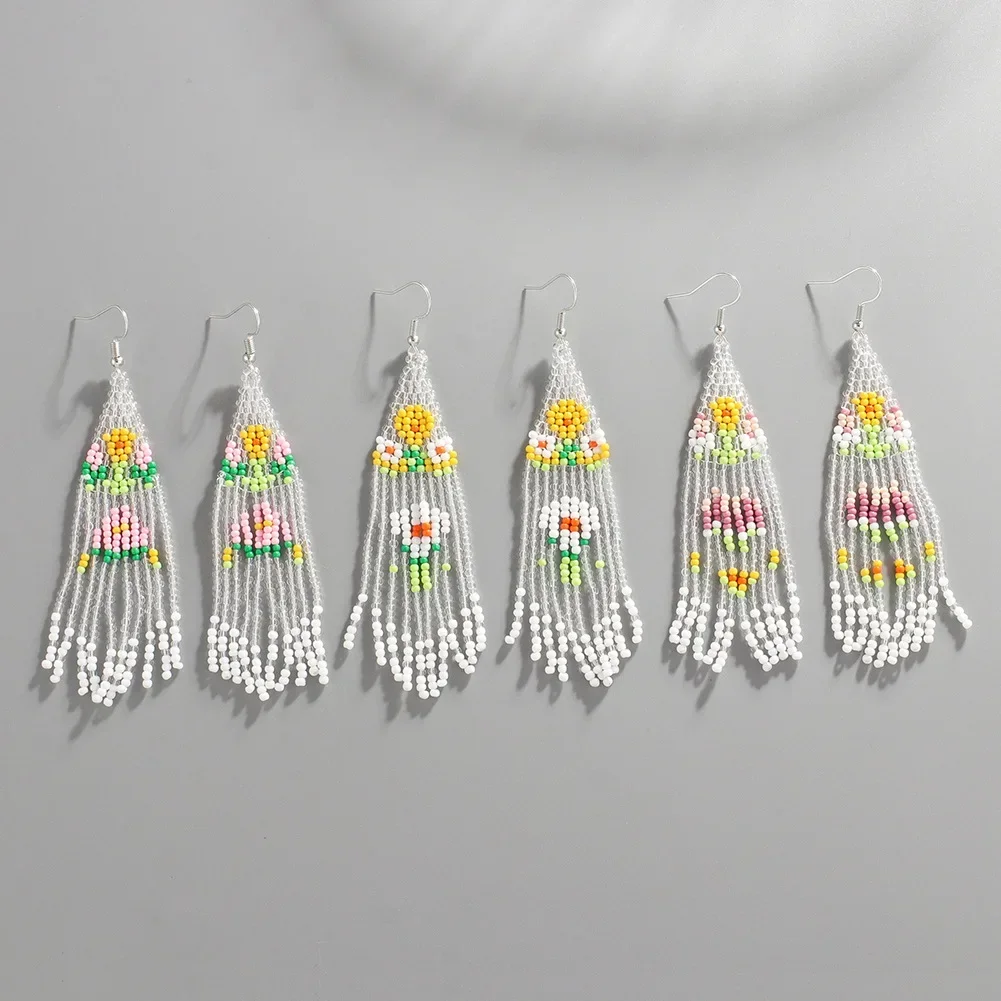 Beaded earrings Tassel Flower Originality Hand knitting Design Tide Bohemia Female Simple Alloy Rice bead earrings