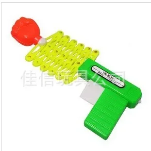 10PCS kinder spielzeug pistole kreative teleskop faust pistole mini lustige elastische frühling magische pistole kleines spielzeug