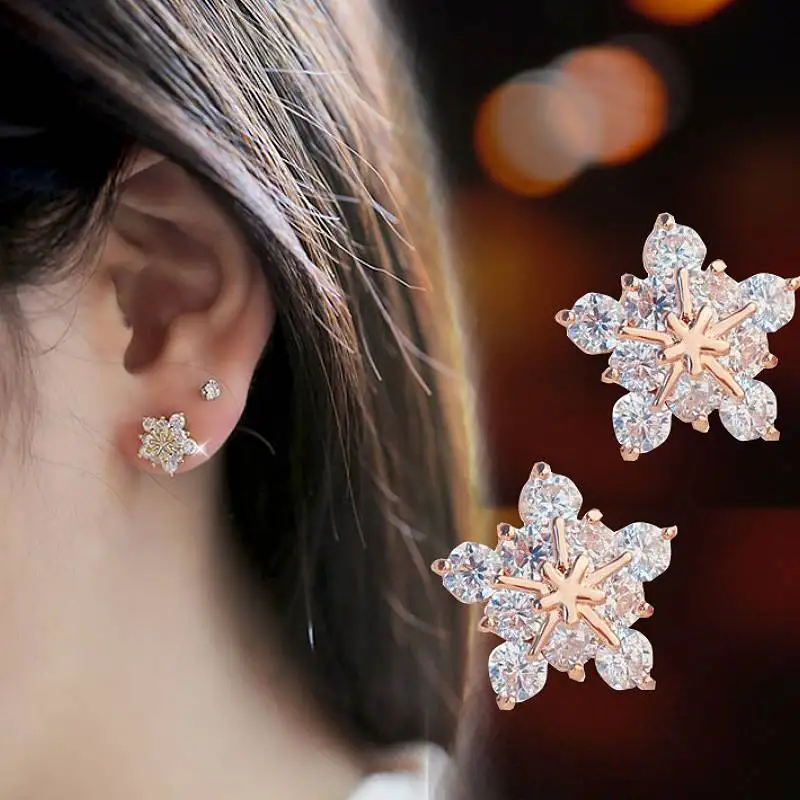 Huitan Ästhetische, schneeflockenförmige Damen-Ohrstecker mit eingelegtem, hellem CZ, elegantes Alltags- und Party-Accessoire, Mini-Schmuck für die Hochzeit