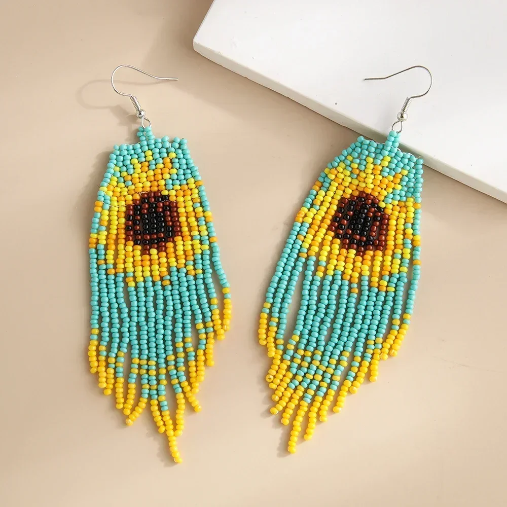 

Beaded earrings Tassel Originality Sunflower Design Geometry Hand knitting Bohemia Alloy Tide Female Simple Rice bead earrings