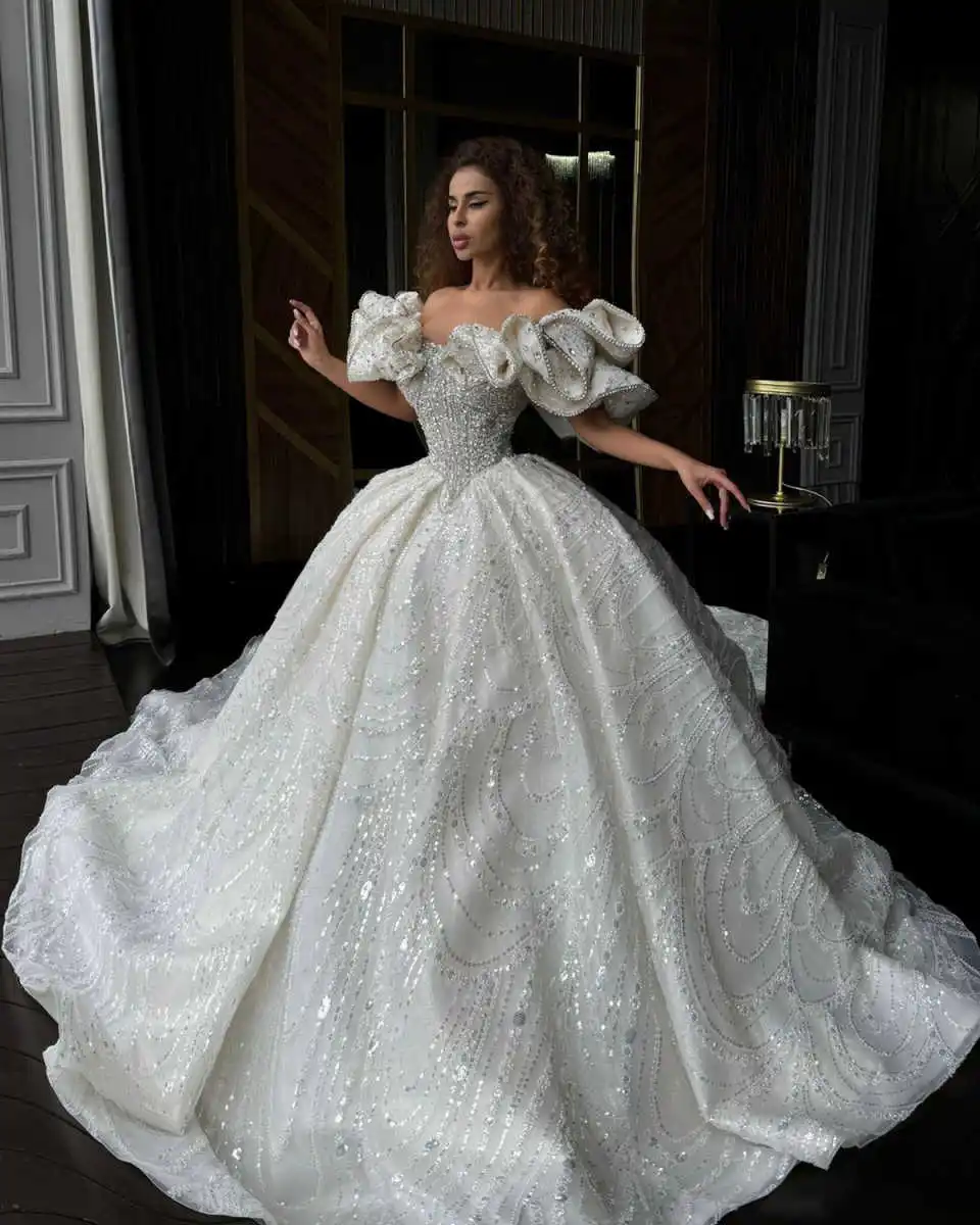 Gorgeous Ball Gown Wedding Dresses Off Shoulder Sleeveless Bridal Gown Sequins Crystal Ruffles Sweep Train Customized Dress