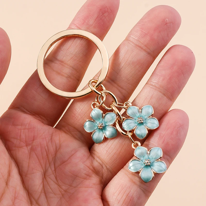 Aihua 40 Farben Niedlicher Pflanzen-Schlüsselanhänger Emaille Sakura-Blumen-Schlüsselanhänger für Frauen Mädchen Handtasche Anhänger Autoschlüsselhalter DIY Schmuck Geschenke – Detail 10