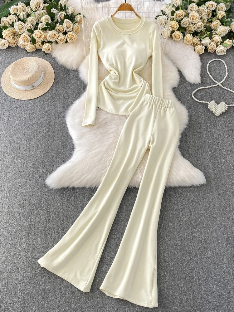 

Minimalist style solid color set women chest cushion round neck slim waist cincined pleated top casual flared pants set