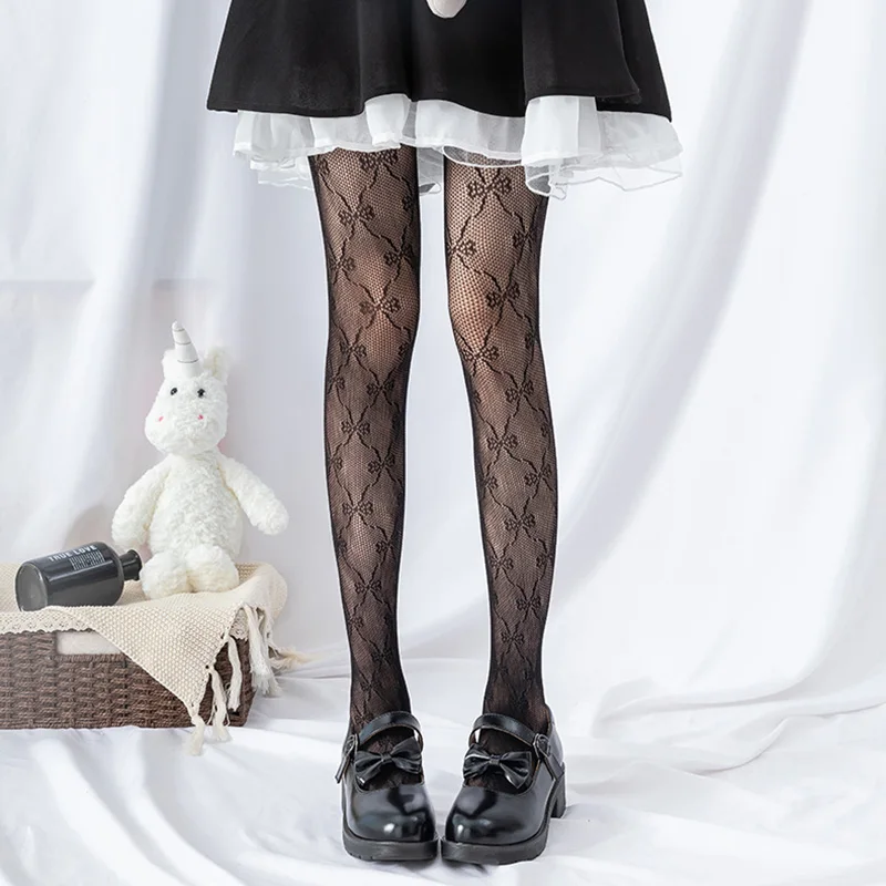 Strümpfe Sexy ausgehöhlte Strumpfhosen mit Boden, klassische Lolita-Fischnetz-Spitze-Mesh-Strümpfe für Damen und Mädchen, Punk-Retro-Strumpfhose mit Schleife und Web