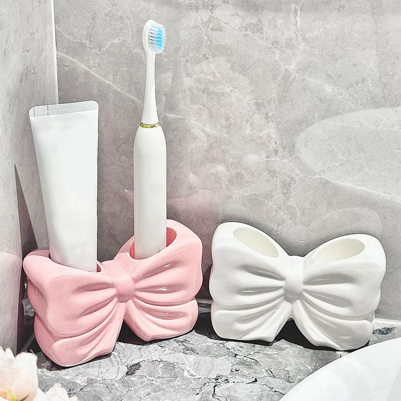 

Ceramic Bow Toothbrush Holder Ornament Cute Bow Knot Toothpaste Storage Rack Makeup Brush Organizer Bathroom Decor Accessories