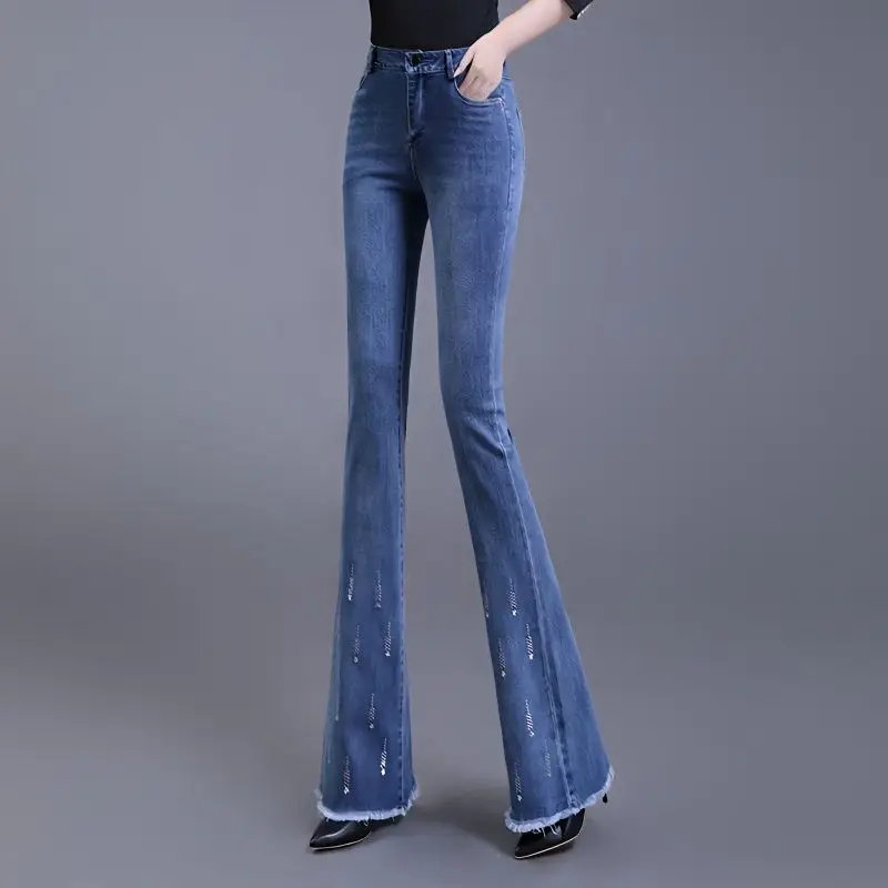 กางเกงยีนส์ MODE Korea บานทรงตรงเอวสูงมีพู่ประดับสำหรับสาวออฟฟิศกางเกงยีนส์ฤดูใบไม้ร่วง