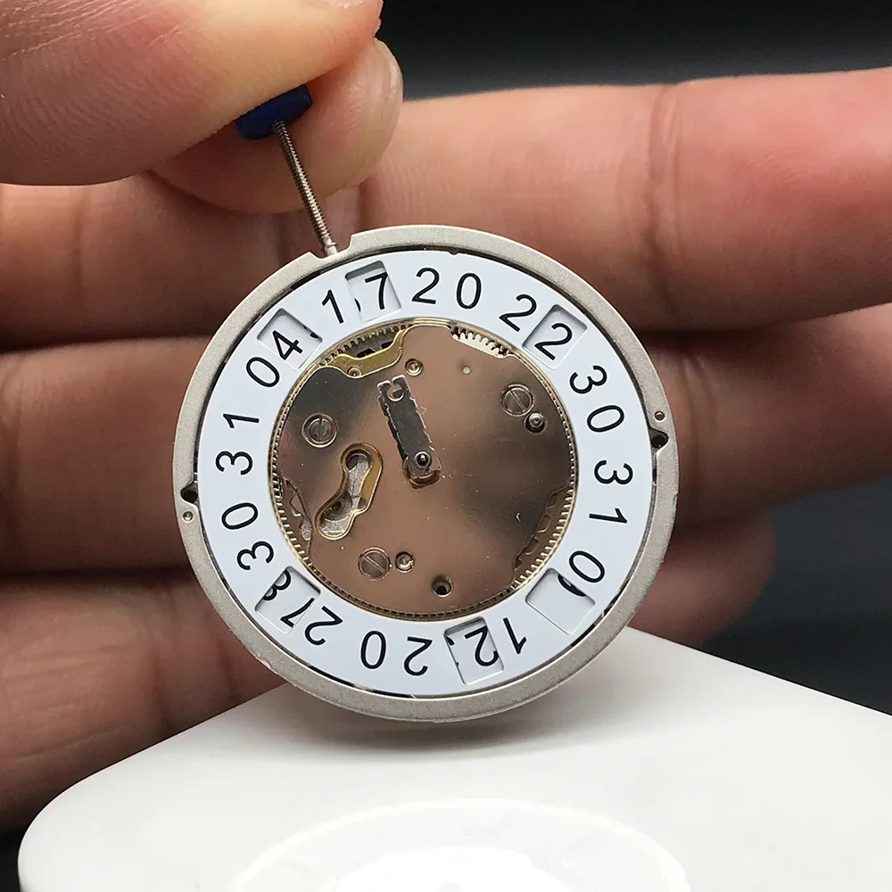 อะไหล่นาฬิกาควอตซ์แบรนด์หรู4210B การเคลื่อนที่ของ Ronda 4ชิ้นพร้อมแบตเตอรี่ภายในกลไกตัวเรือนสีเงิน