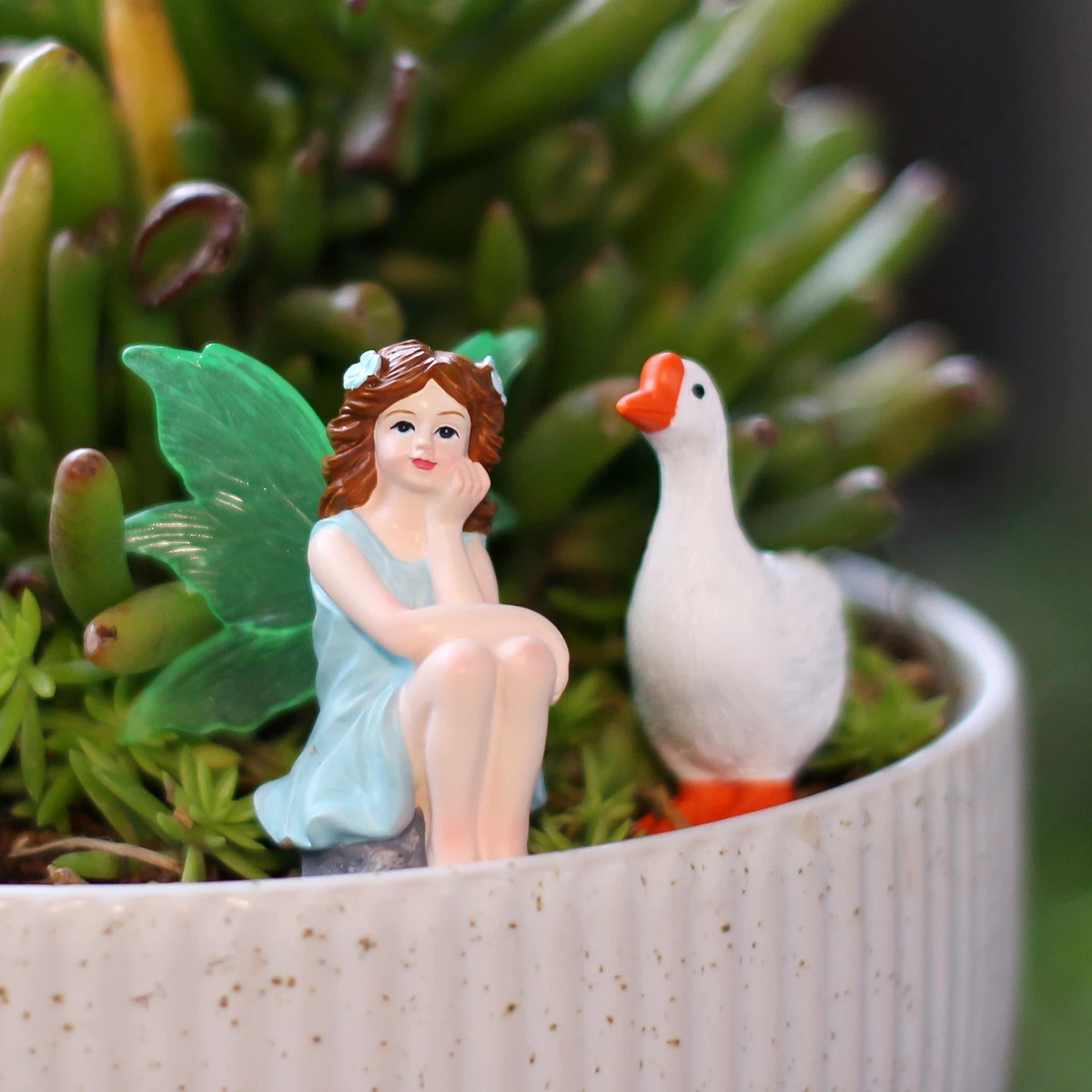 2 zittende feeën en ganzen, cr - Bonsai Garden World recensie en prijs