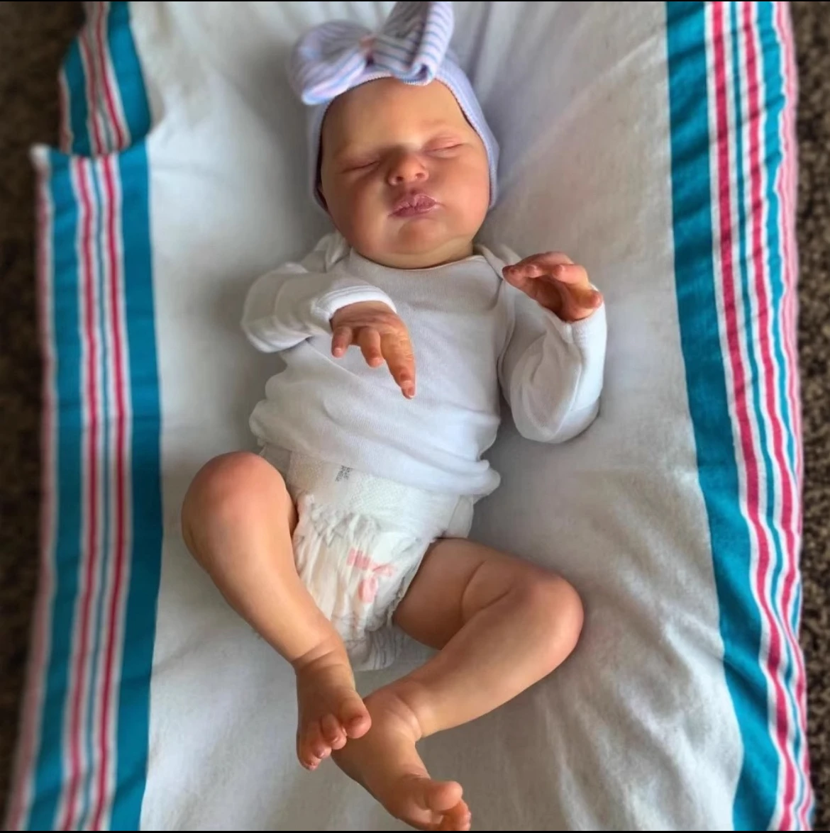 

18" Laura Deluxe Reborn Baby Girl - Lifelike Sleeping Face Design | Hand-Stitched Couture Outfits | Safe & Cuddly Gift for Kids