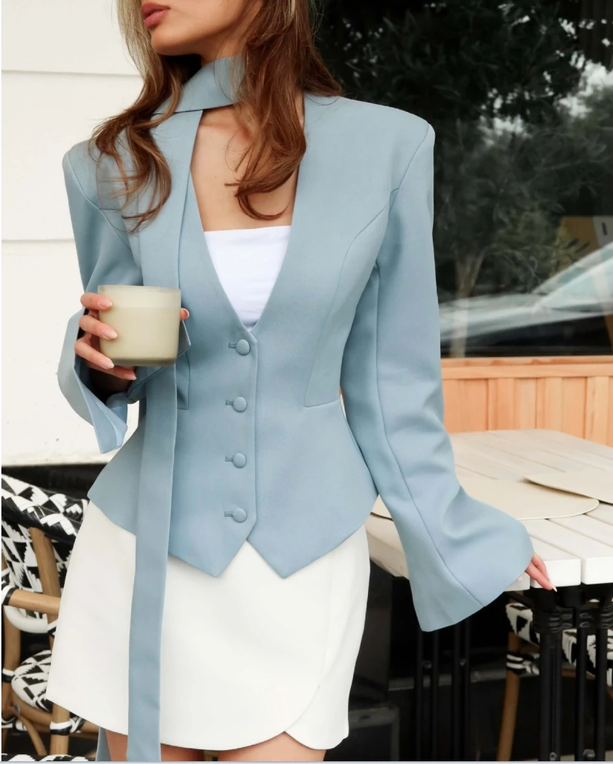 Roupas femininas 2025 nova moda cor sólida com decote em v tem um senso de design cachecol com manga longa casual pequeno terno jaqueta topo