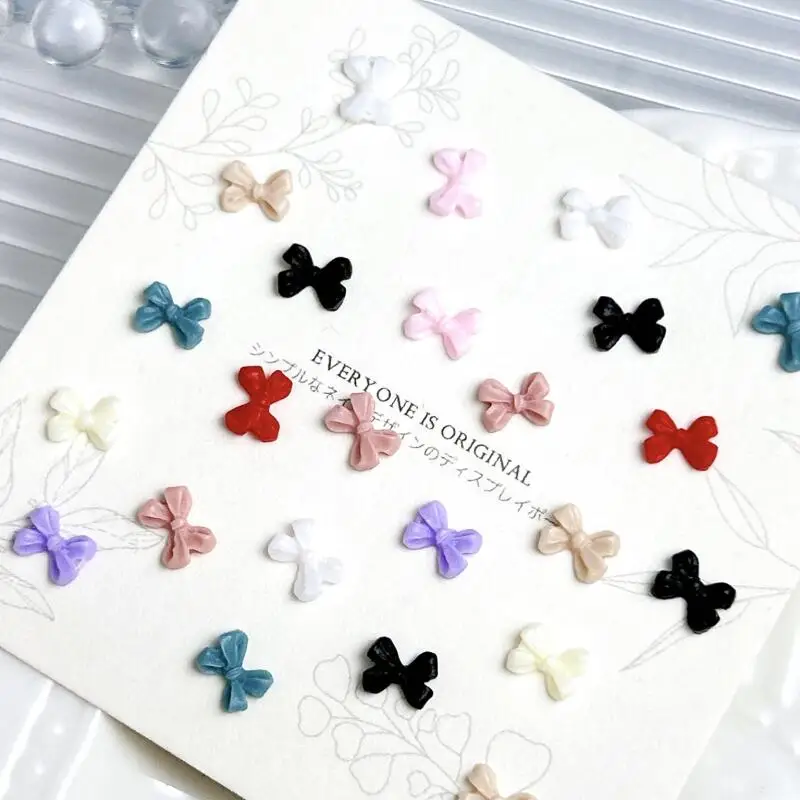 50PCS 3D Mini Minimalist Bow Nail Charms Solid Color Resin Bowknots Sweet Style Nail Art Decorations for DIY Manicure Supplies