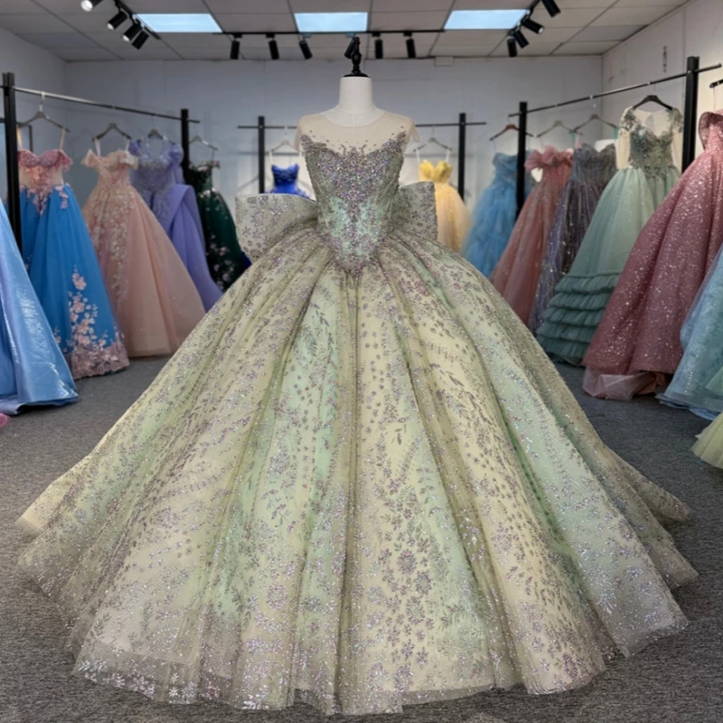 

Green Shiny Quinceanera Dresses Ball Gown Off The Shoulder Sequin Applique Lace Bow Beading Crystal Tull Corset Sweet 16 Dress