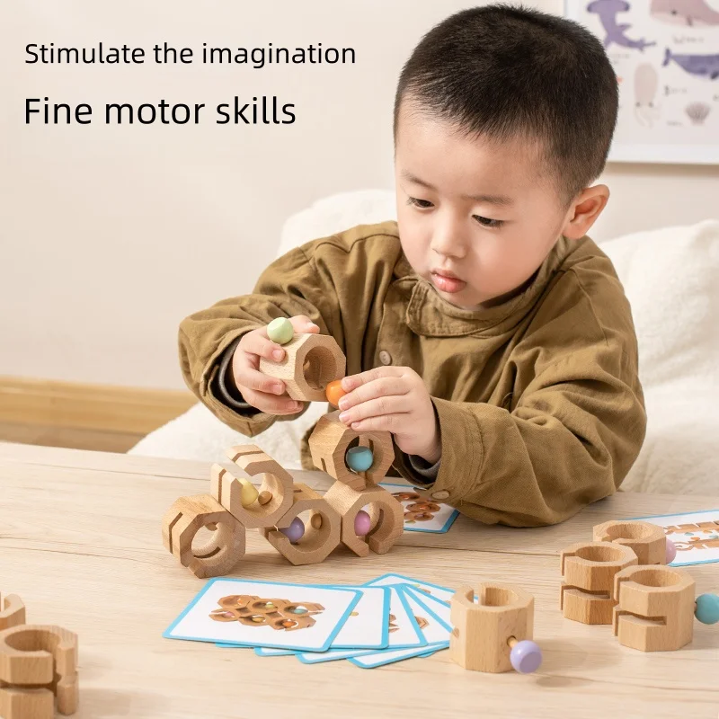 Bunte Nussspielzeuge aus Holz in verschiedenen Formen und Farben – Kinder können drehen und spielen, um Hand-Auge-Koordination und kognitiven Ski entwickelt