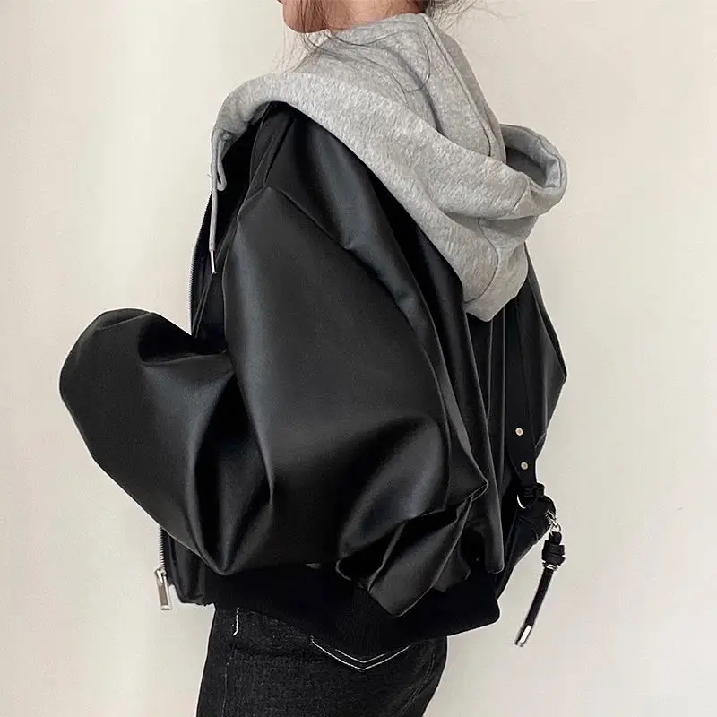 シックな秋冬ルーズカジュアルフード付きジッパーダブルケットフェイクツーピースレザージャケット多用途オールマッチカジュアルコート