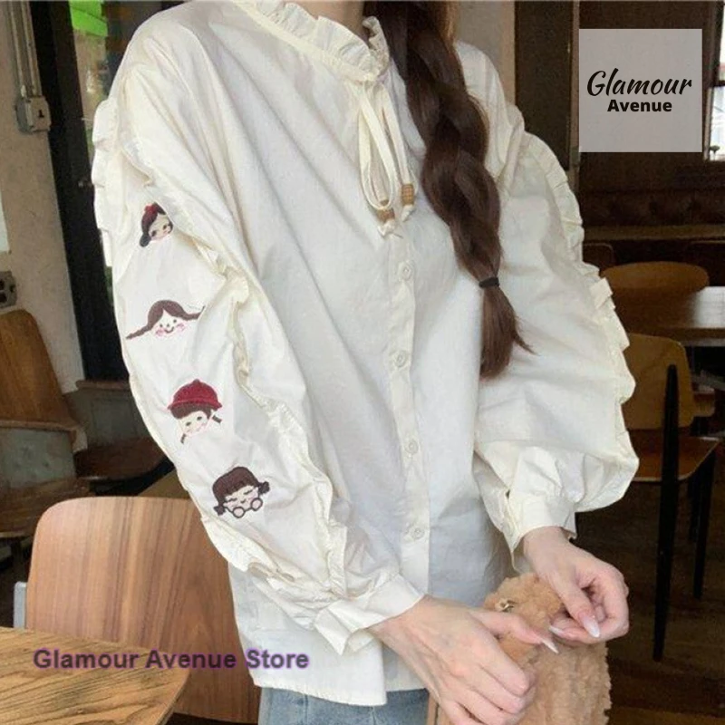 

Korean wooden ear bubble sleeve long-sleeved lace-up shirt female spring and autumn new sweet design sense niche blouse female