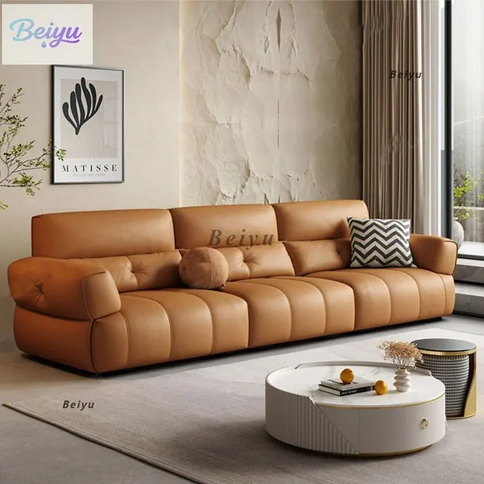 

Итальянский минималистичный светлый роскошный кожаный диван для гостиной, современный простой скандинавский кожаный художественный диван для большой и маленькой квартиры, прямой ряд