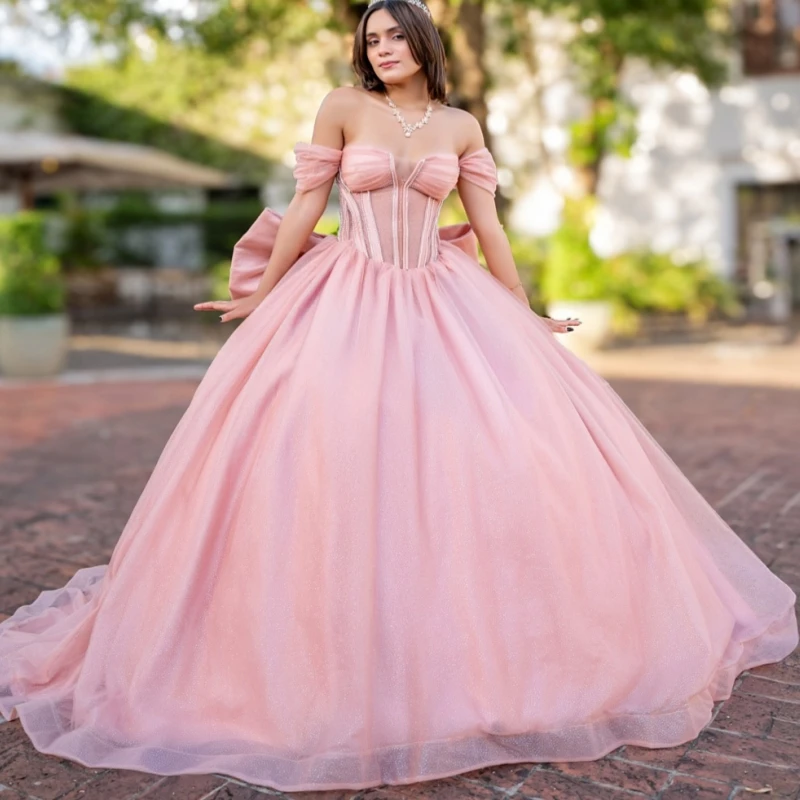 

Light Pink Shiny Ball Gown Quinceanera Dresses 2026 Beading Bow Tull Corset Off Shoulder Sweet 16 Dress Vestidos De 15 Anos