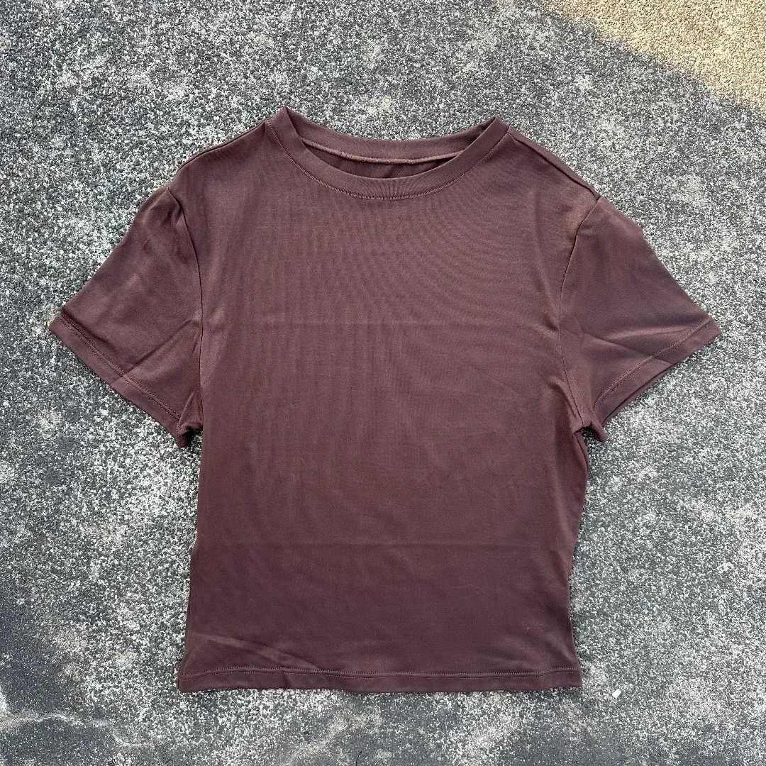 Damska koszulka do jogi z krótkim rękawem, oddychająca, w jednolitym kolorze, do treningu fitness, obcisła, z odkrytym pępkiem.