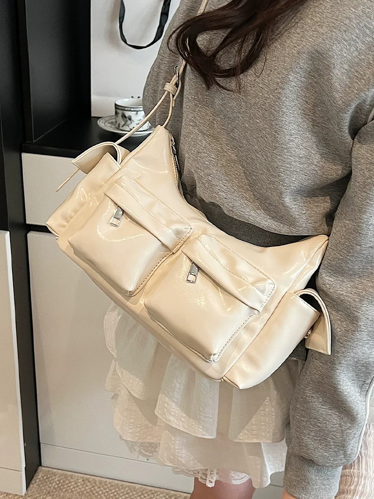 

2025 Spring New Simple and Versatile Commuting Dumpling Bag for Women High Quality Texture Commuting Crossbody Bag Two Pockets