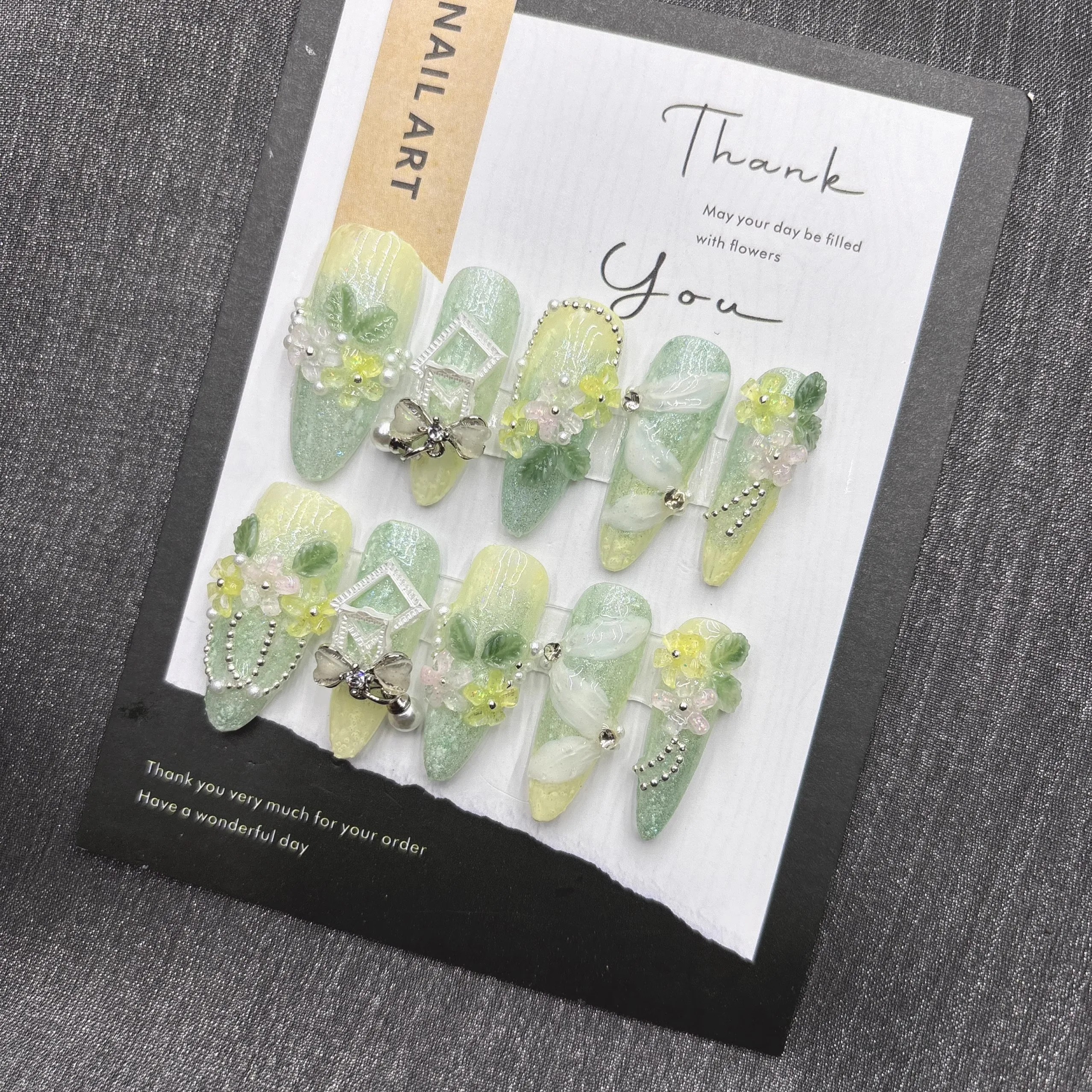 

Nature-Inspired Soft Green Floral Press-On Nails with Flexible Silk Botanicals and Oxidation-Resistant Metal Details Perfect for