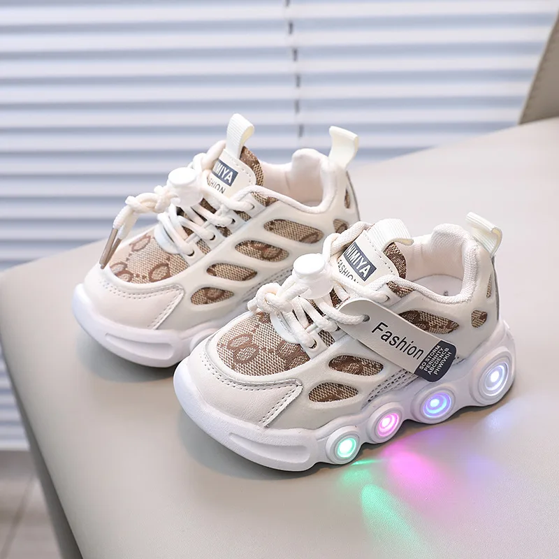 Primavera nuove scarpe luminose a LED scarpe per bambini panno a nastro traspirante bambini 1-6 anni scarpe luminose scarpe sportive per il tempo