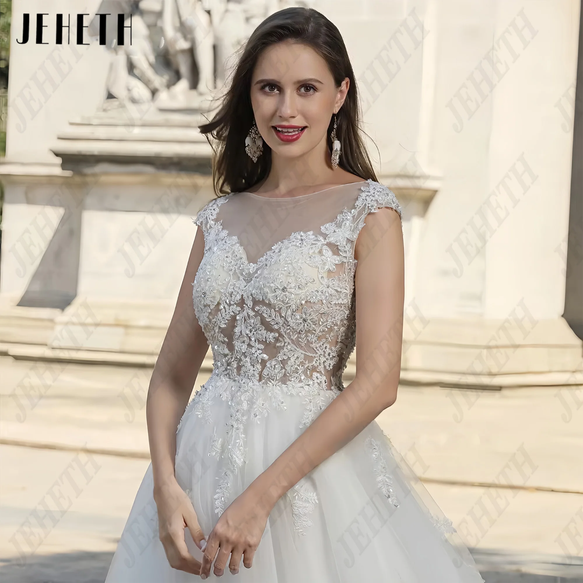 JEHETH A-line senza maniche Scoop Tulle Abito da sposa Decalcomania del pizzo Backless Lussuoso abito da sposa sexy Vestido 2025 Personalizzato JEHETH A-linea senza maniche Scoop Tulle abito da sposa pizzo decal senza