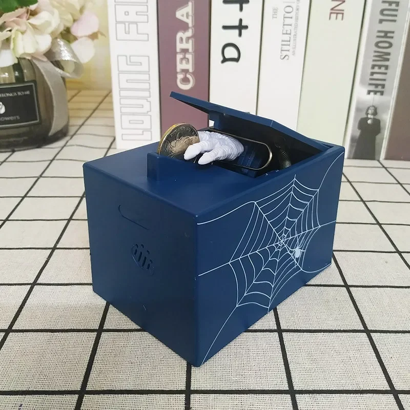

Steal Money Ghost Hand Figures Spoofing Piggy Bank Children Cartoon Electric Coin Music Savings Gag Toy Practical Jokes Kid Gift
