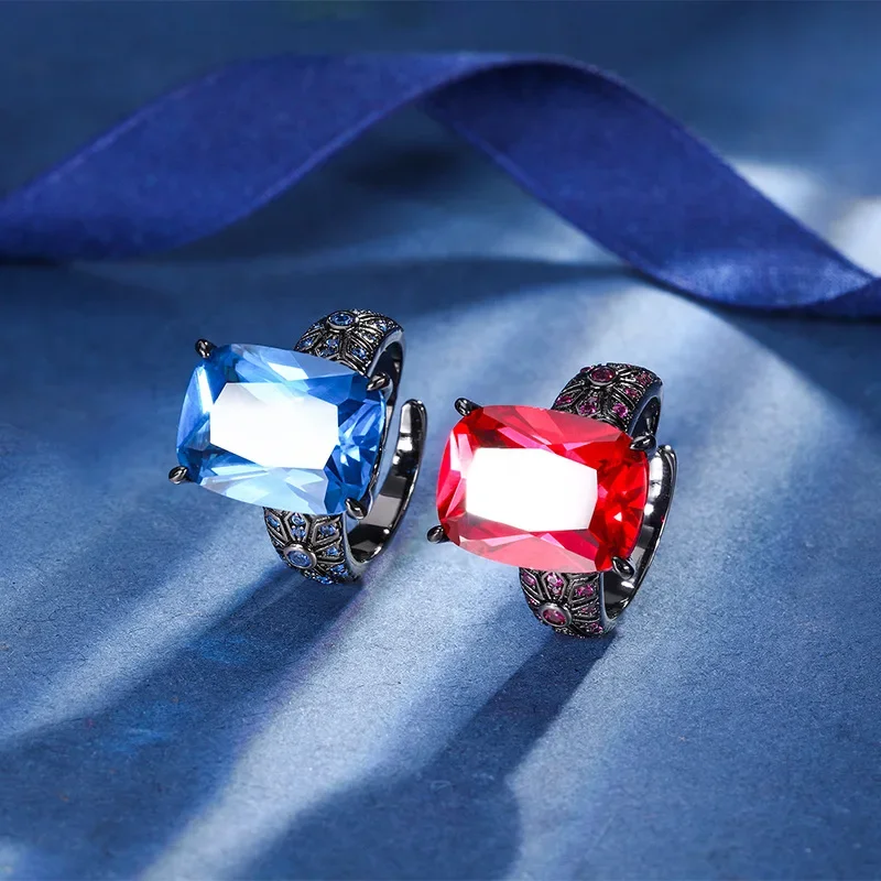 New high-end jewelry copper base plated with black gold retro red corundum blue spindle personality ring female main stone 12*16