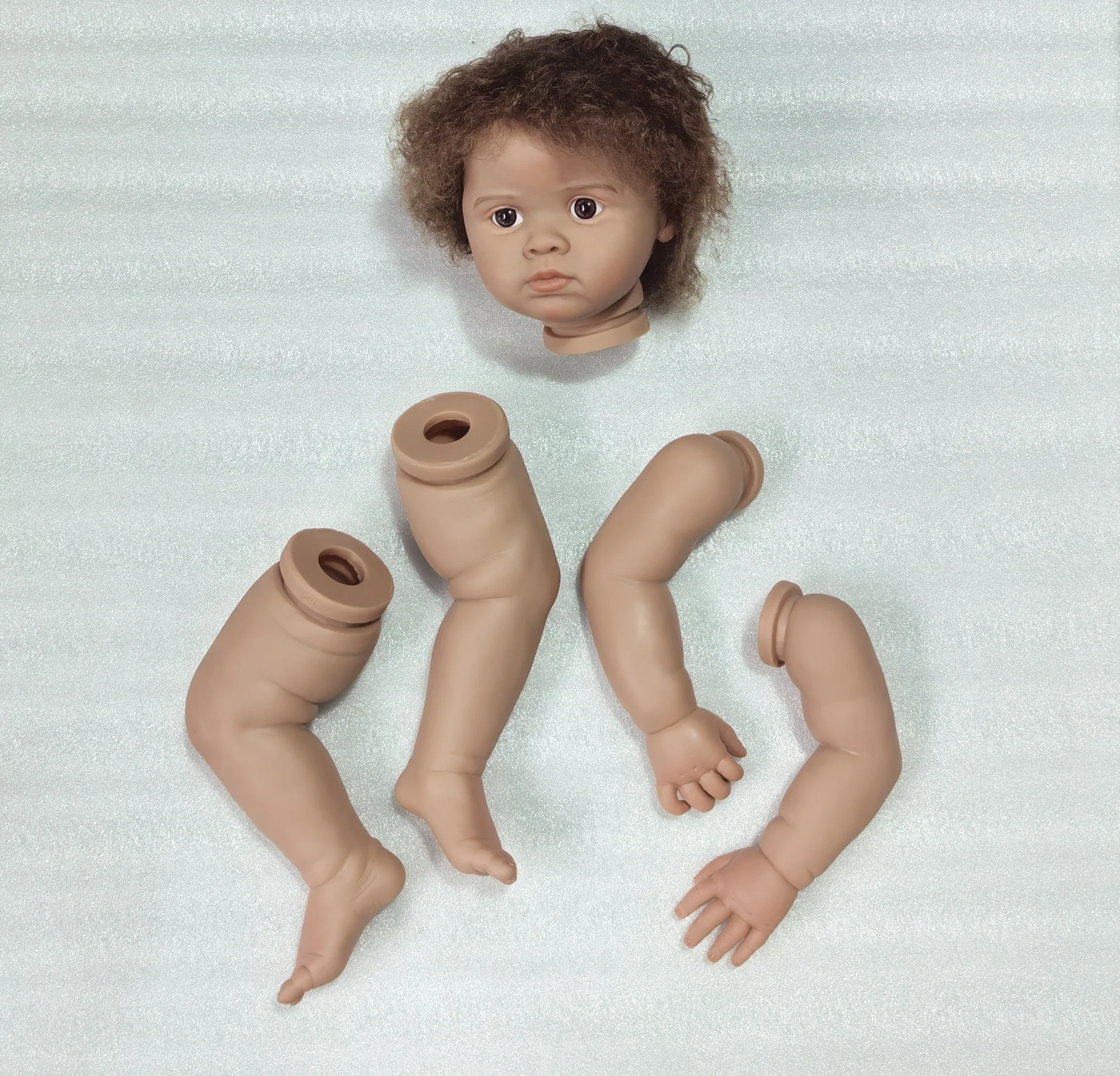 

NPK 22inch Lifelike Dark Skin Reborn Doll Kit Unfinished Painted Doll Parts with Hand Rooted Hair for Collectors