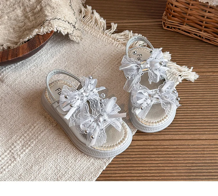 Mädchen-Sandalen mit Süßen Spitzen-Schleifen, Kinder-Strandschuhe im Koreanischen Stil, Weiche Sohle, Sommer 2026 Neuheit, Kinder-Prinzessinnen-Schuhe mit Offener Spitze – Detail 9