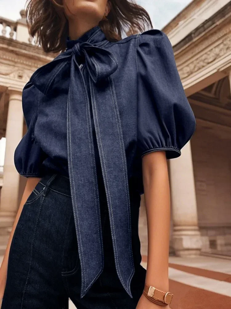 Beautyblue المرأة موضة عالية الرقبة تقليد قمصان جينز نفخة الأكمام البلوزات الصيف جديد عادية بلون ربطة القوس فيونكة القمم الإناث