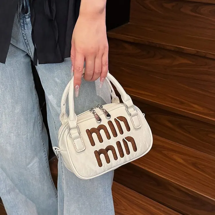 

Minimalist Commute Purse, Structured Compact Style, Detachable Shoulder Strap, Polished Hardware, Day-to-Night Wear, New 2026