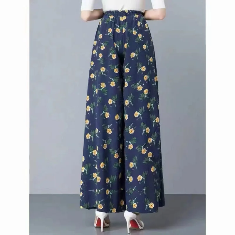 2023 Summer New Fragmented Flower Skirt Pants Women's Loose Casual Fashion Elastic High Waist Printed Ice Silk Wide Leg Trousers