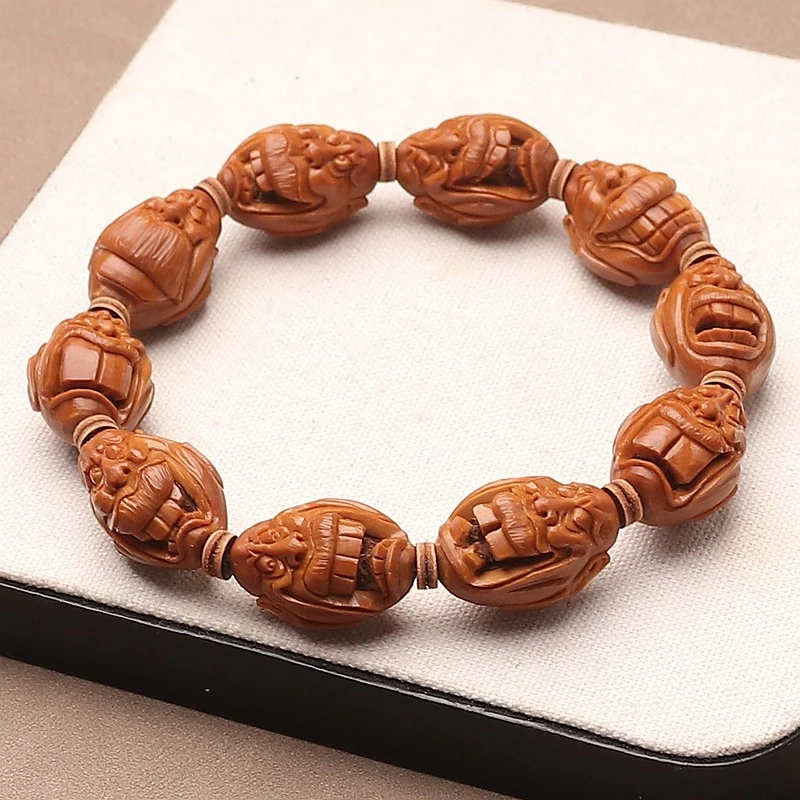 Natural Olive Stone Handmade Quirky Face Bracelet With Large Protruding Teeth And Hollow Design