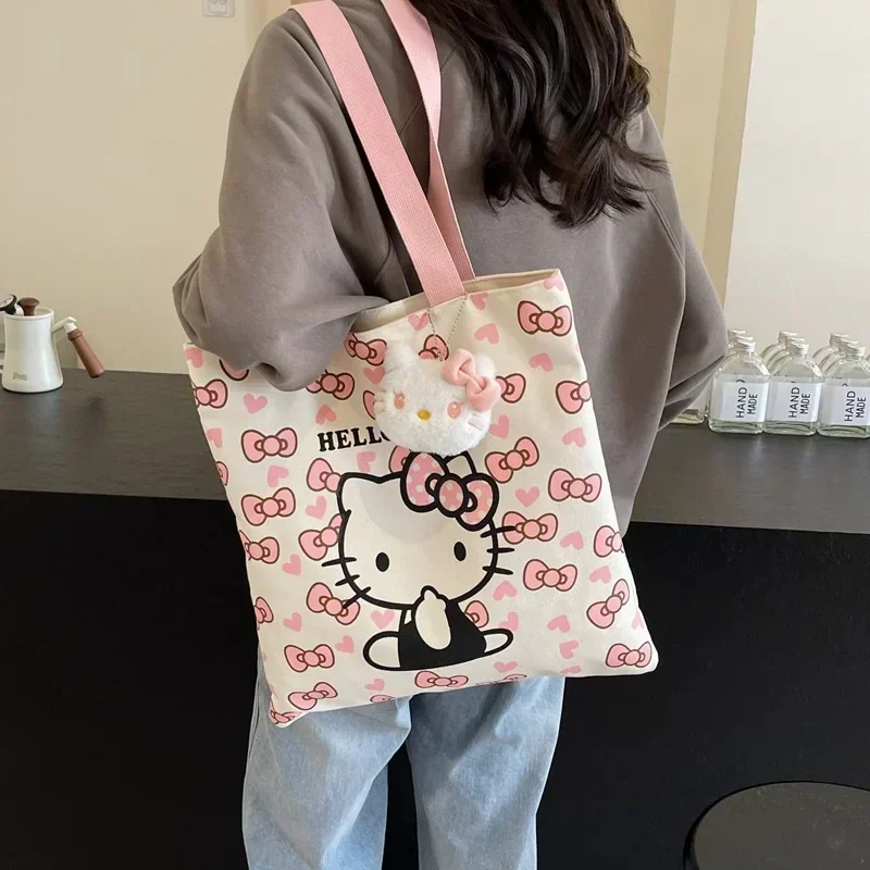 

Sanrio hello kitty cute canvas tote bag female cartoon large capacity shoulder bag handbag middle school student schoolbag