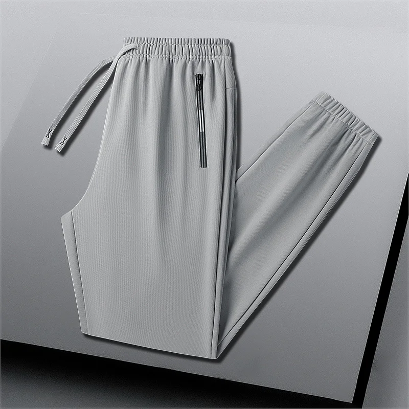 

Sports Men's Fashionable and Versatile Elastic High-waisted Solid Color Zipper Pocket Casual Pants
