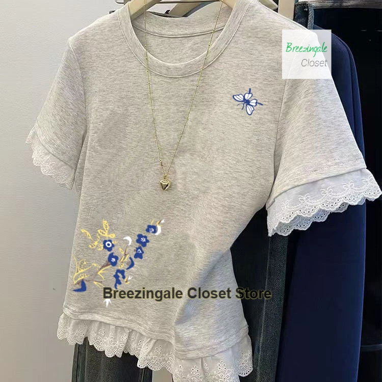 

French grey printed lace stitching fake two short-sleeved T-shirts women's summer new cotton design slim and slim short tops.