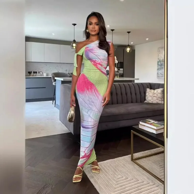 Europa Mujer 2025 Verano nueva moda Sexy Spice malla cuello oblicuo bolso largo vestido con glúteos Vestidos De Verano Mujer