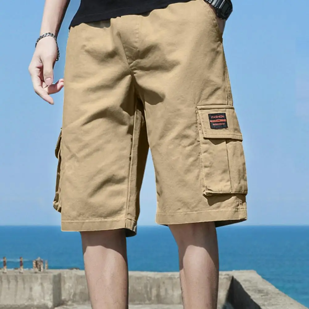 Pantalones cortos transpirables para hombre, Shorts Cargo con cintura elástica, múltiples bolsillos, ropa de calle de verano, hasta la rodilla ajuste suelto, deporte